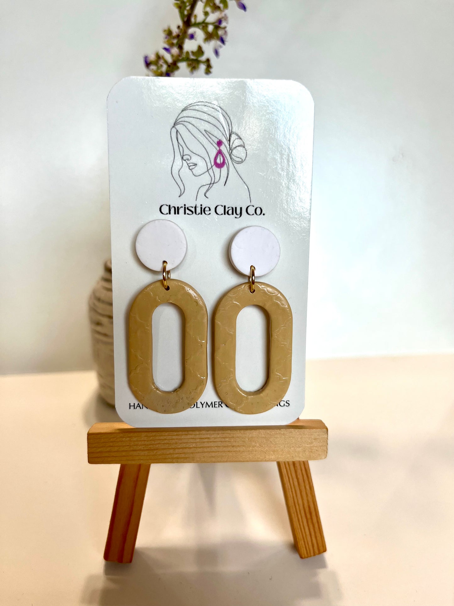 White and brown dangle imprint