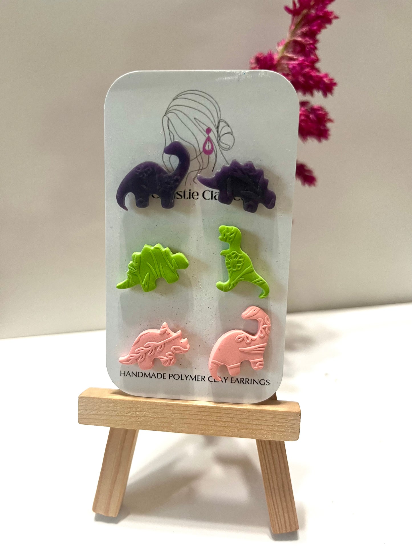 Dinos-Set of three pink, green, and purple