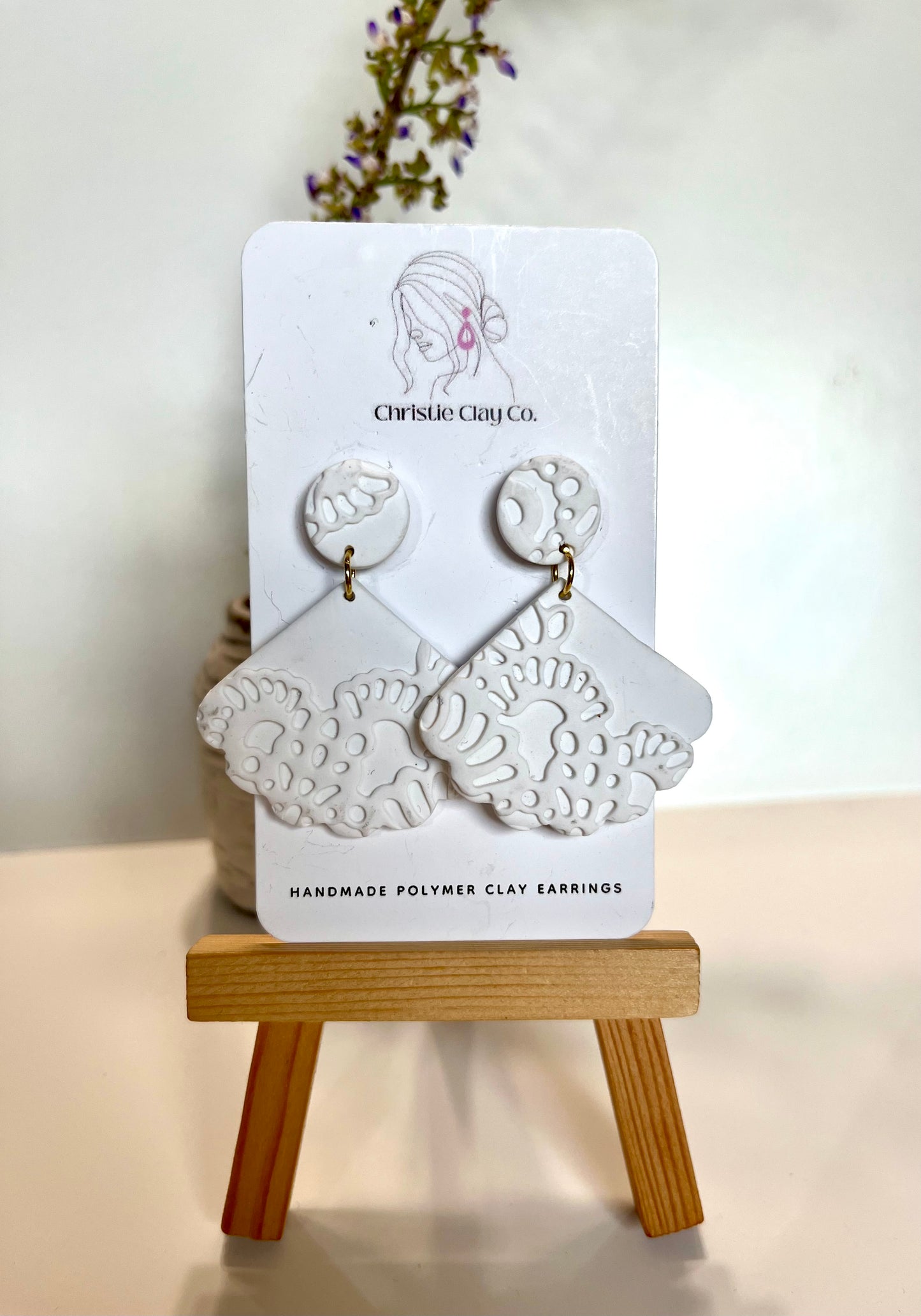 White imprint dangle