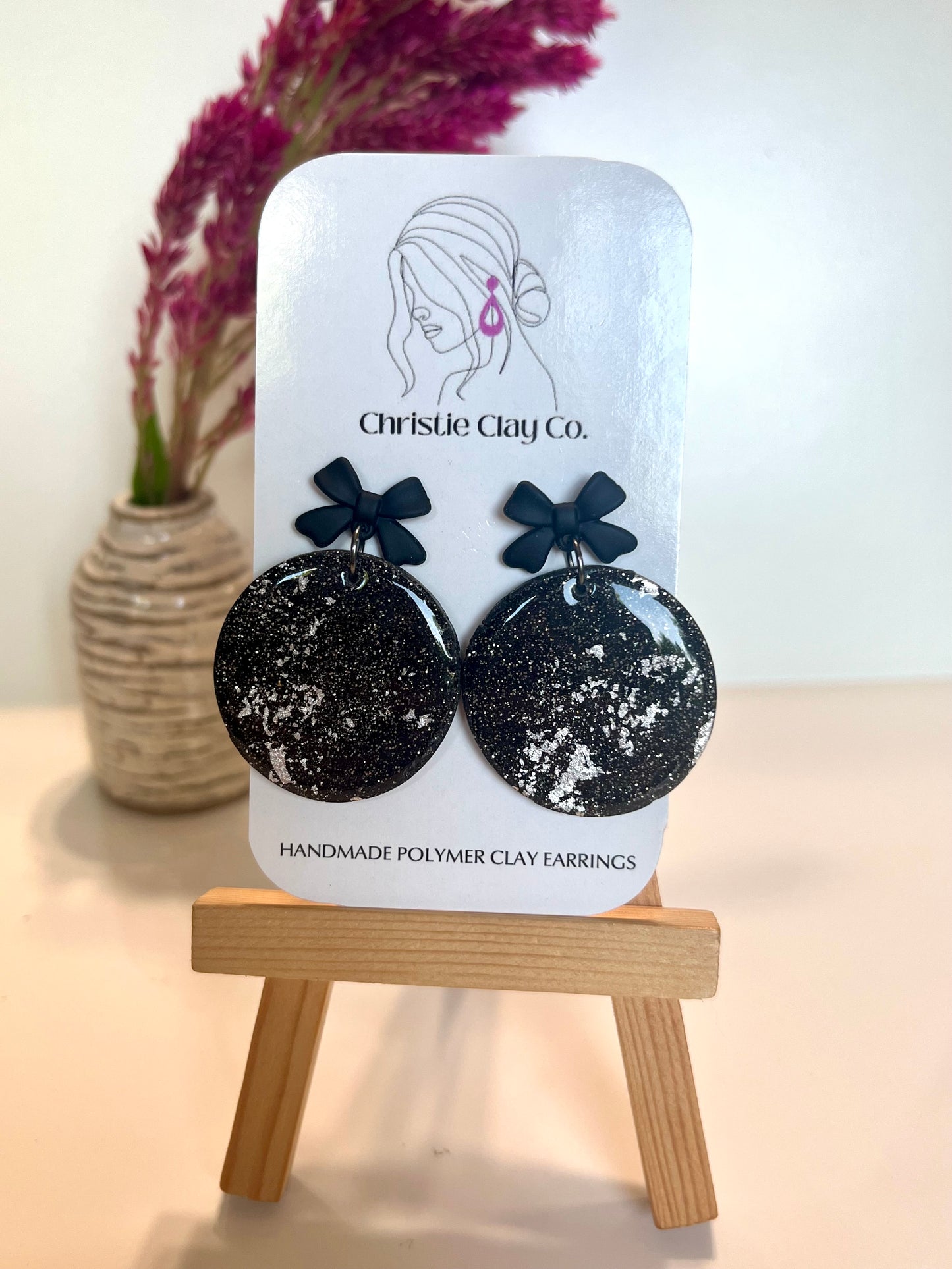 New Year’s Eve-Black circle with silver foil and bows