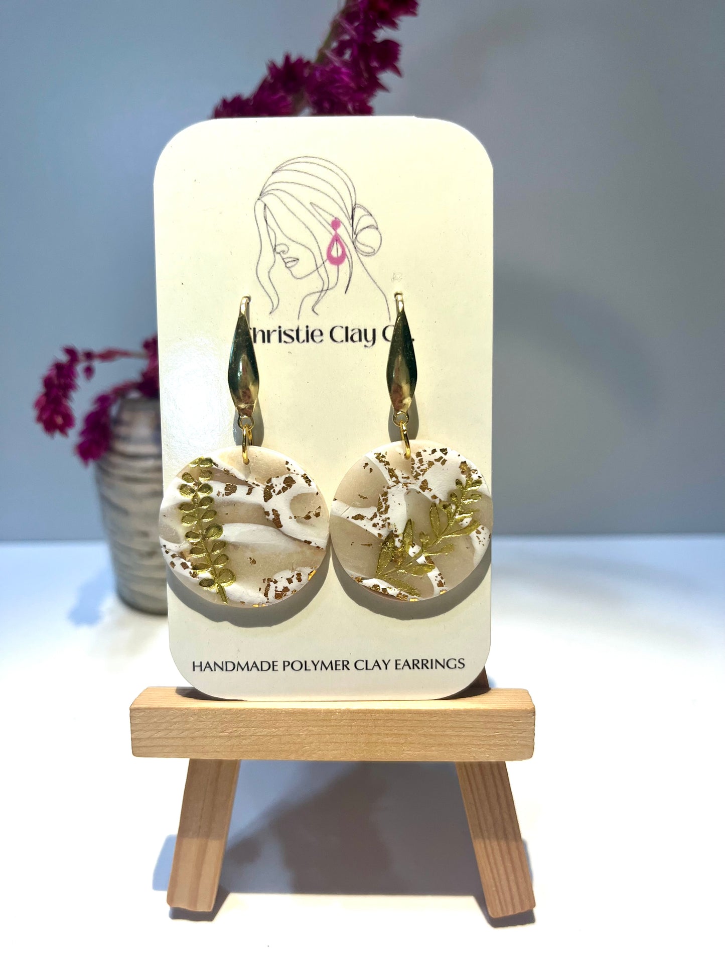 Cream marble with gold foil and leaf imprint