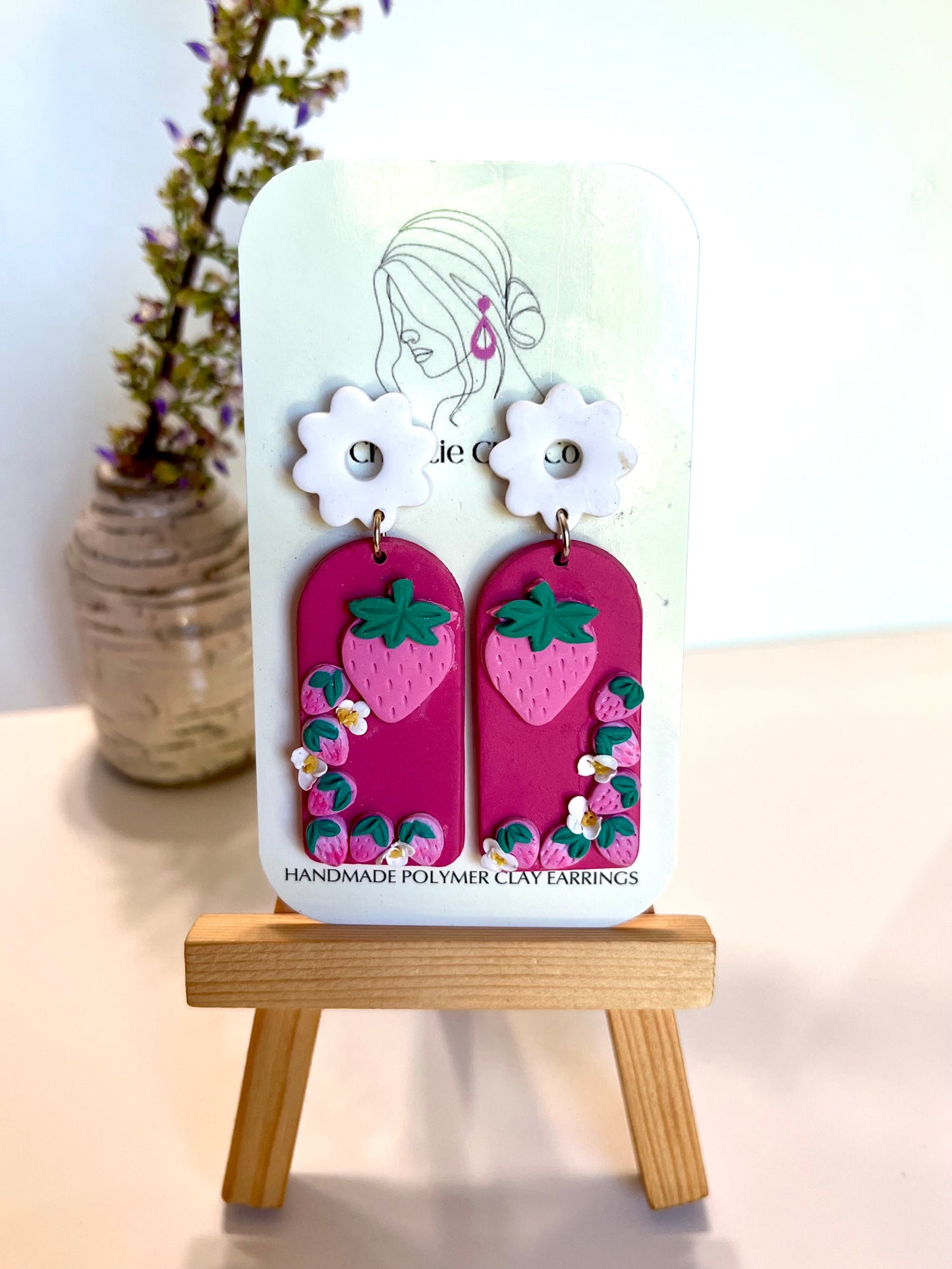 Strawberry-Dangles with white floral toppers