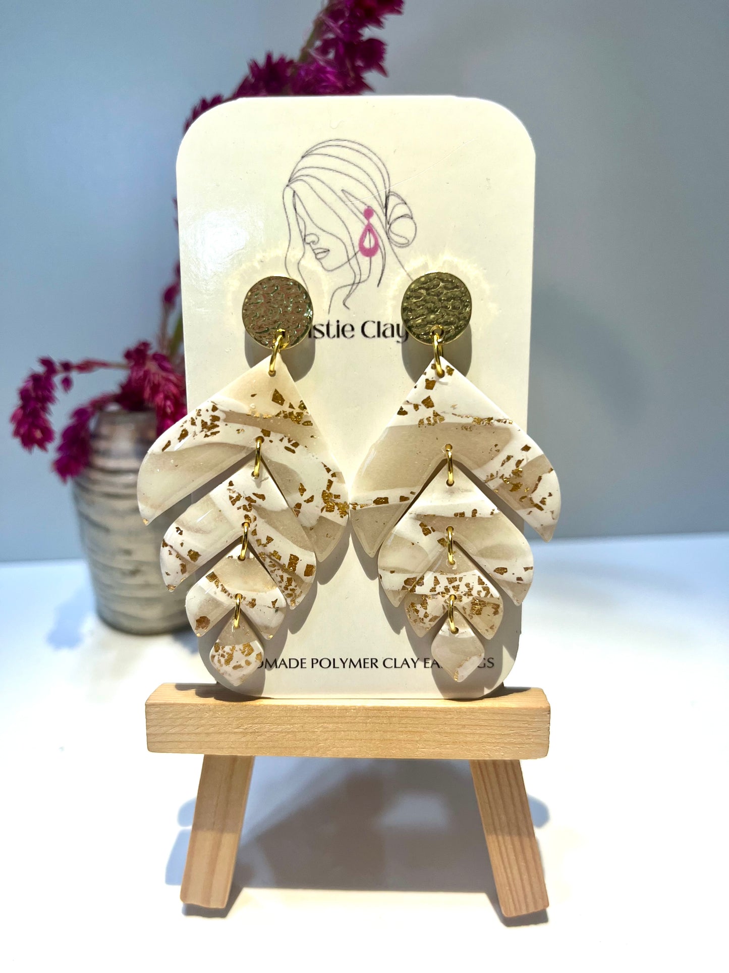 Cream marble tiered with gold foil and gold stamped finding