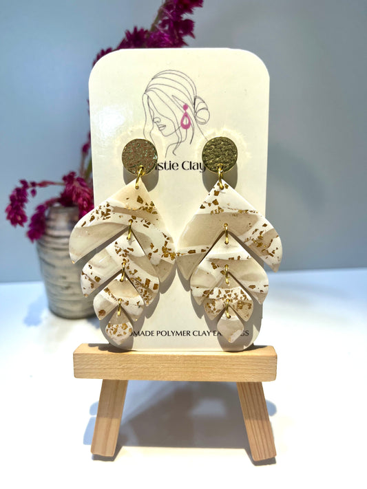 Cream marble tiered with gold foil and gold stamped finding