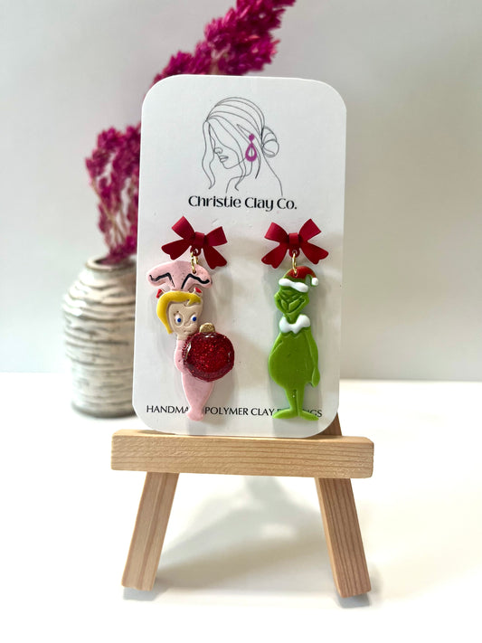 Christmas-Red bows and green meanie with little girl