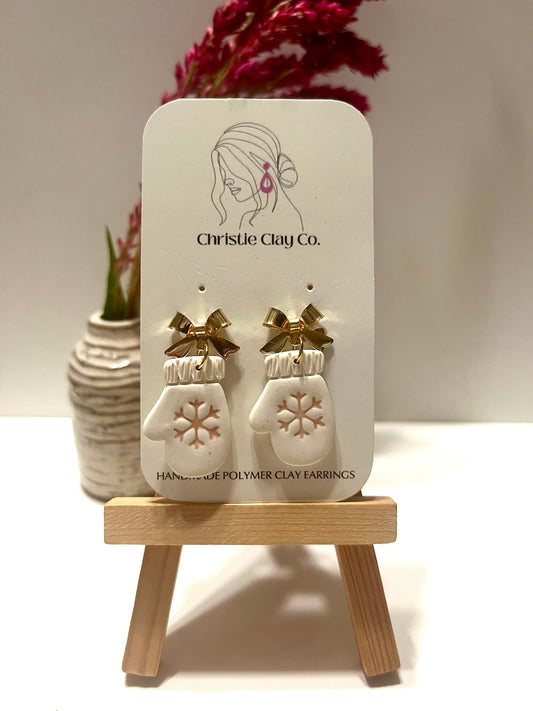 Winter-Gold bow with white mittens and pink snowflake imprint clip-ons