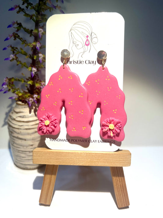 Pink arch with flowers