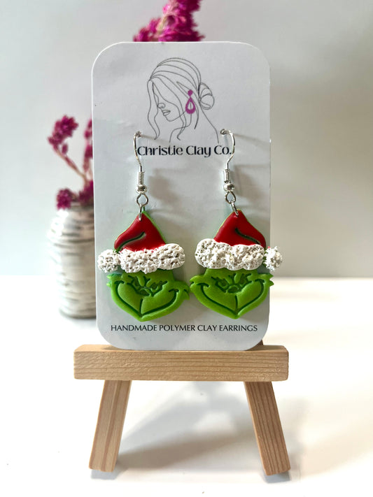 Christmas-Green meanie wearing Santa hat