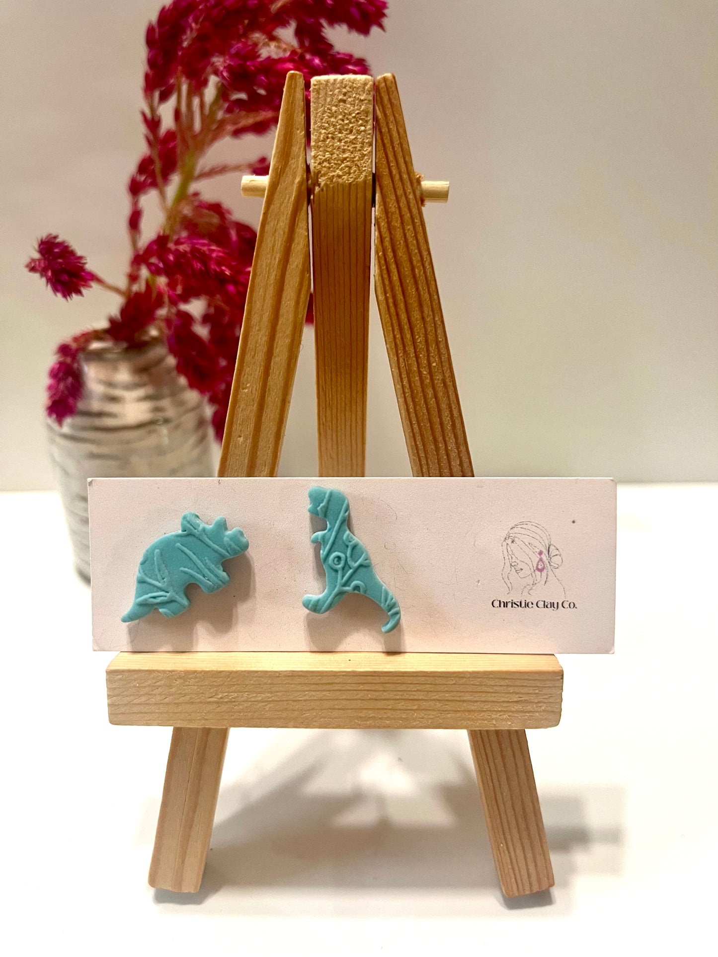 Dinos-Blue studs with imprint