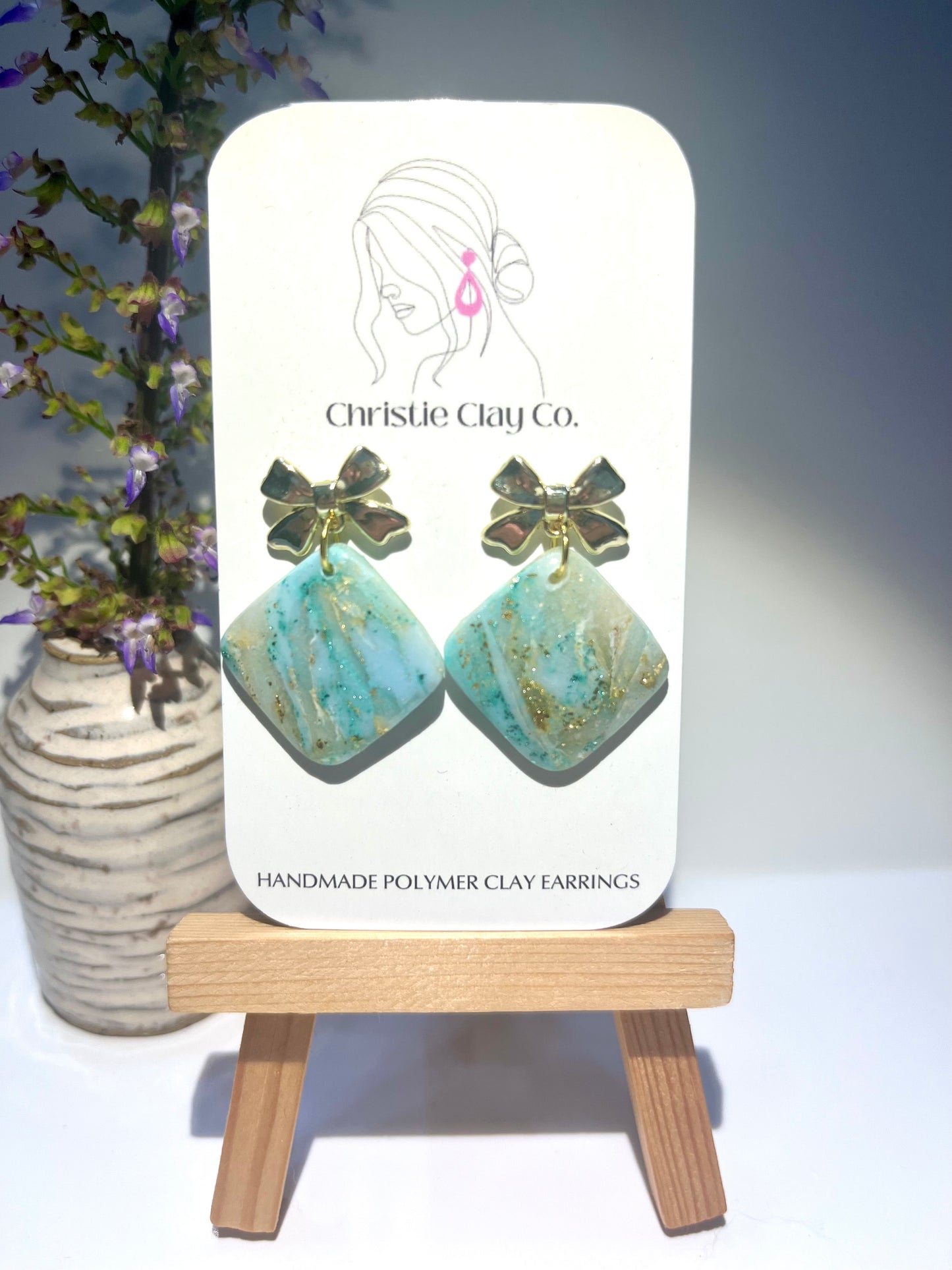 Light Turquoise Marble-Diamonds with gold bows