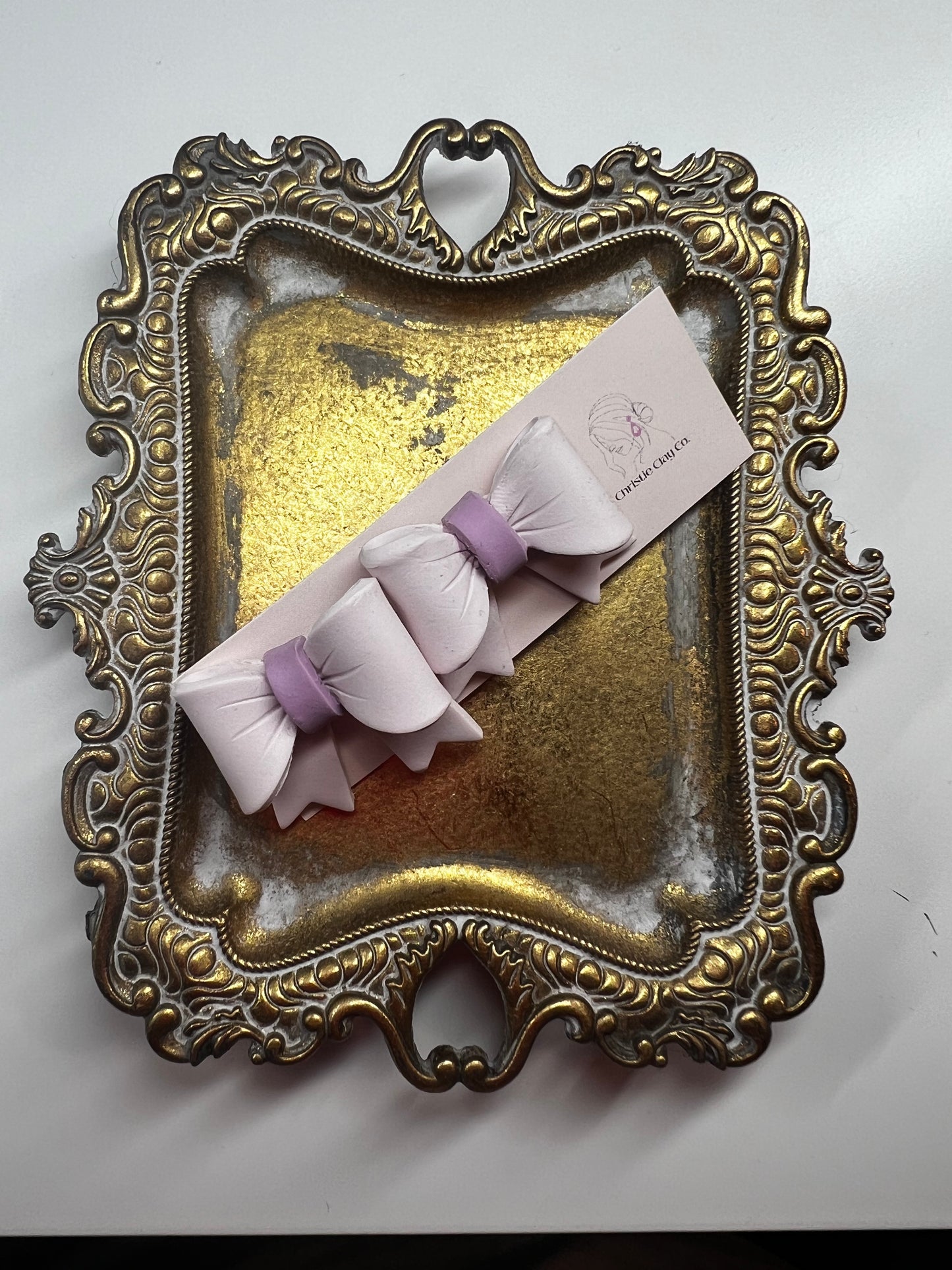 Spring.  Pink and Lavender Bow studs.