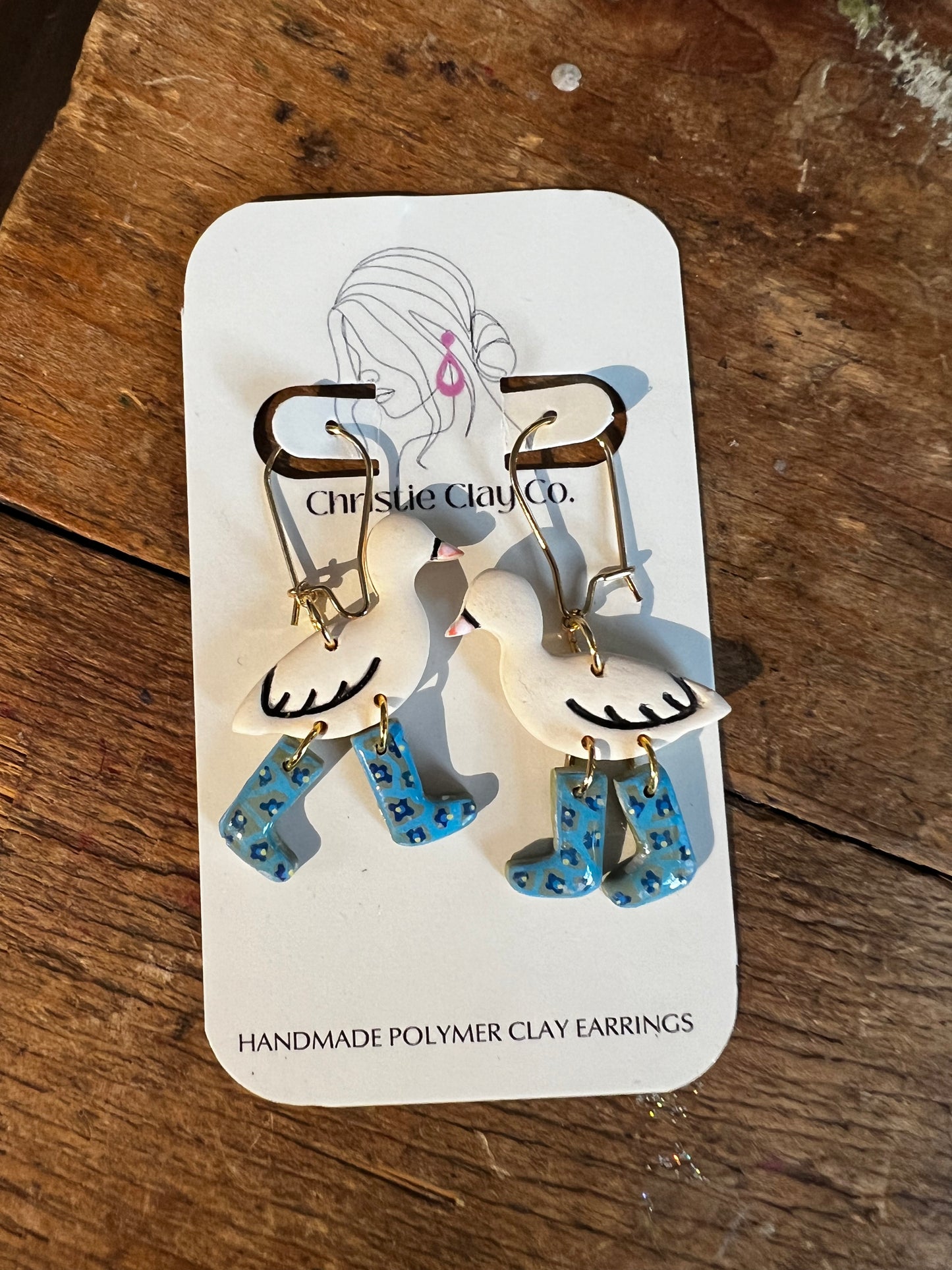 Whimsy.  Ducks with boots